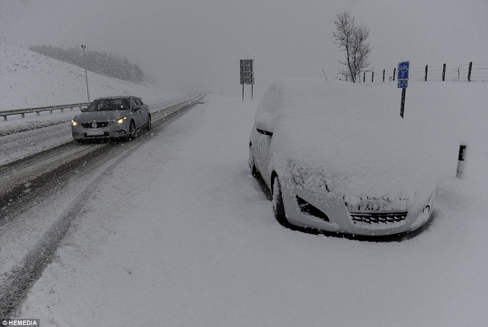 Forecasters say that up to seven inches of snow could fall on the higher grounds of Scotland such as the Drumochter Pass in the Highlands, pictured