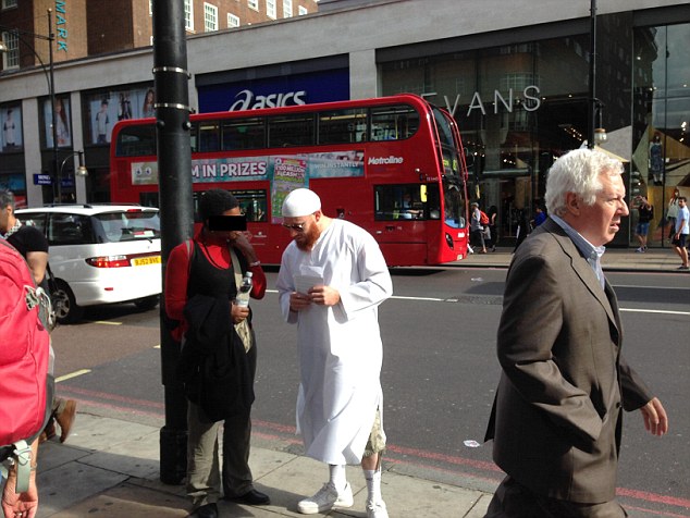 Age SIX and groomed for jihad in British suburbia: Shocking image of UK extremism, taken by little boy's Muslim convert father