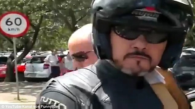 Shocking video- hows woman driver smashing motorcyclist ramming road parked cars kicked vehicle Shocking video- hows woman driver smashing motorcyclist ramming road parked cars kicked vehicle