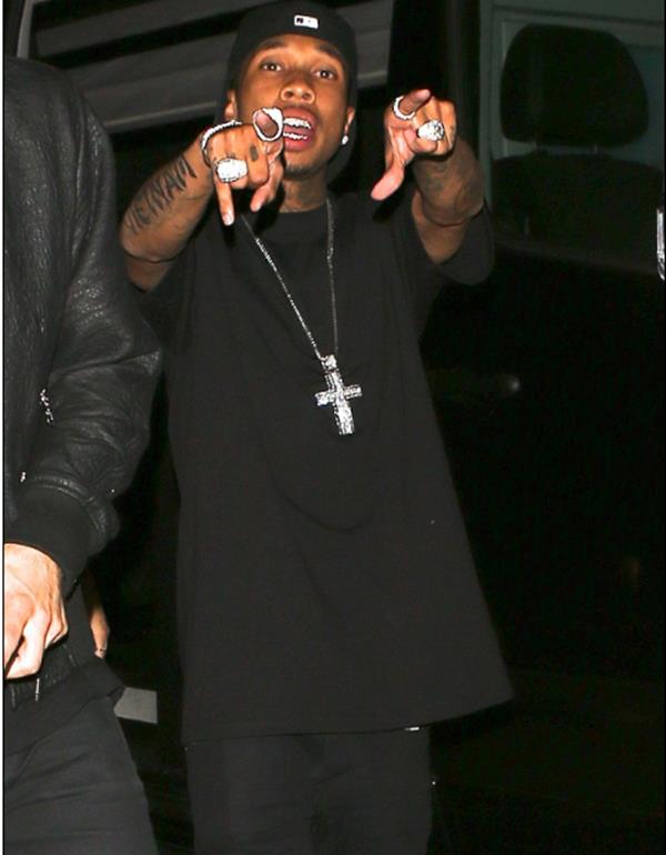 Nearly nude! Kylie Jenner dons flesh-coloured bikini to go with her braided hair in another revealing selfie