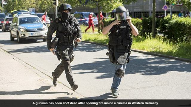 A gunman has been shot dead after opening fire inside a cinema in Western Germany