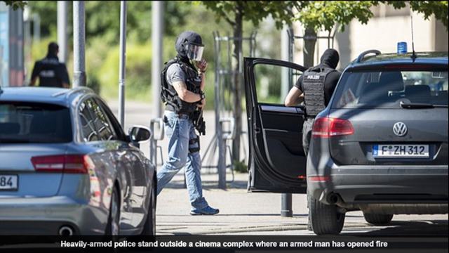 A gunman has been shot dead after opening fire inside a cinema in Western Germany