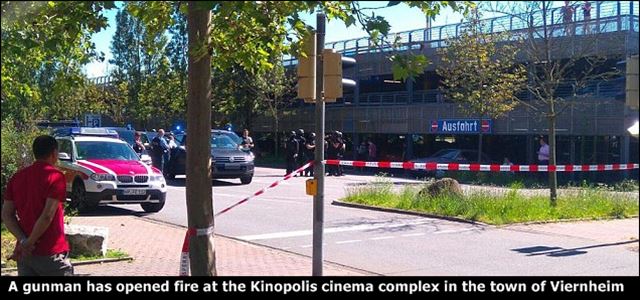 A gunman has been shot dead after opening fire inside a cinema in Western Germany