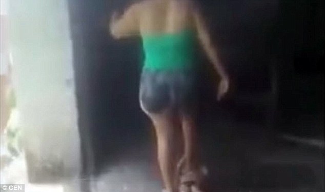 Mother sparks outrage after she is filmed punishing her young boy by standing on his chest so hard he can't cry out in Guatemala 