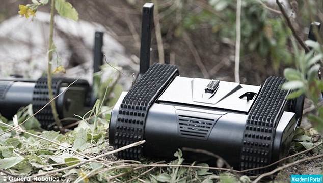 The tiny drone tank packing a pistol: Israeli 'combat robot' has its own remote controlled Glock to shoot at enemies