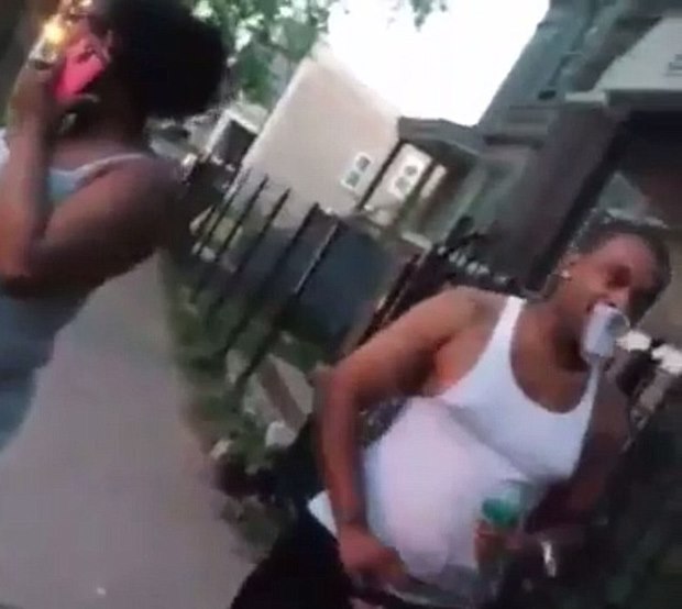 Terrifying moment a Chicago 'gang member', 28, unwittingly streams his own shooting death on Facebook