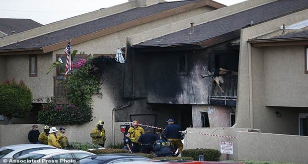 Small aircraft crashes into Los Angeles town house killing two