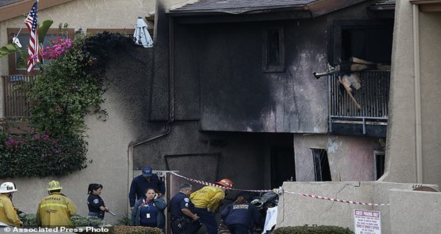 Small aircraft crashes into Los Angeles town house killing two