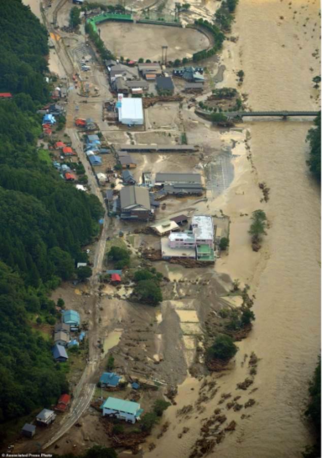 Floods from 100mph typhoon sweep through Japan