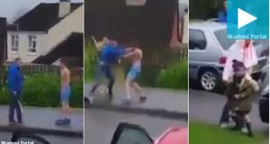 Thugs brawl with hurling sticks as parents collect children - Video
