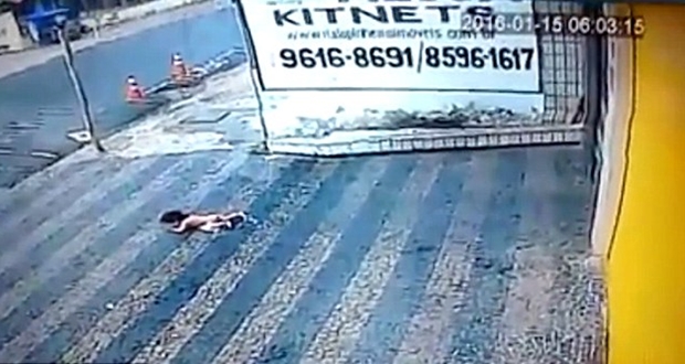'Horrifying moment a toddler falls from a second-floor window'