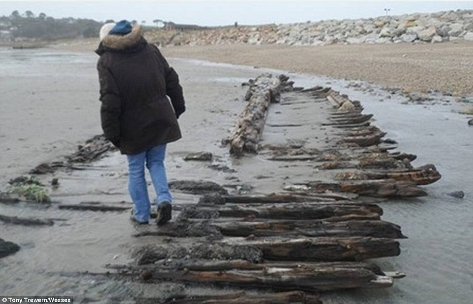 Calamity castle: Queen's neighbour flees 450-year-old home next to Balmoral which was left teetering on brink by rising flood waters as storms uncover 130-year-old ship wreck off Cornish coast