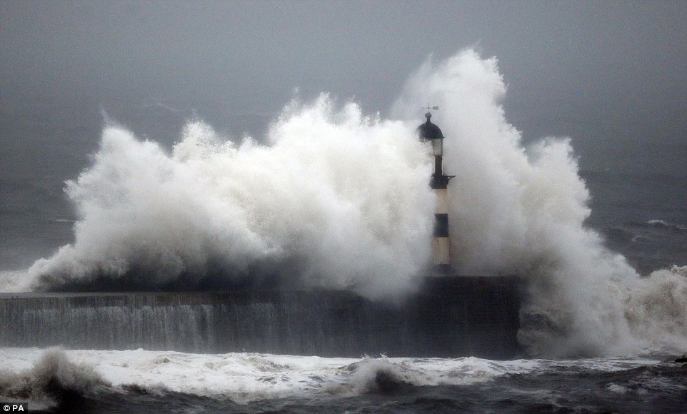 Calamity castle: Queen's neighbour flees 450-year-old home next to Balmoral which was left teetering on brink by rising flood waters as storms uncover 130-year-old ship wreck off Cornish coast