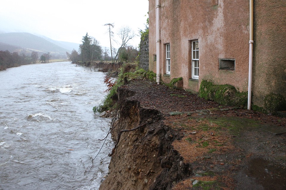 Calamity castle: Queen's neighbour flees 450-year-old home next to Balmoral which was left teetering on brink by rising flood waters as storms uncover 130-year-old ship wreck off Cornish coast