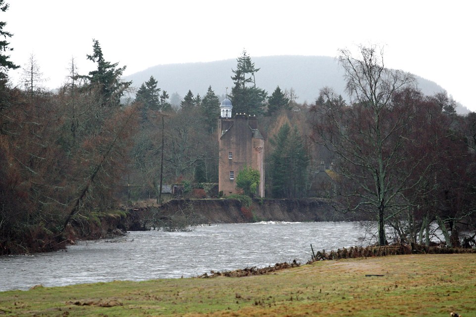 Calamity castle: Queen's neighbour flees 450-year-old home next to Balmoral which was left teetering on brink by rising flood waters as storms uncover 130-year-old ship wreck off Cornish coast