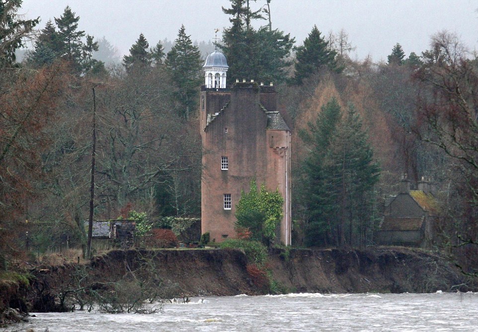 Calamity castle: Queen's neighbour flees 450-year-old home next to Balmoral which was left teetering on brink by rising flood waters as storms uncover 130-year-old ship wreck off Cornish coast