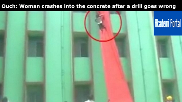 Ouch: Woman crashes into the concrete after a drill goes wrong