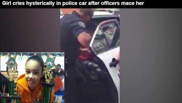 Shocking video shows: Girl cries hysterically in police car after officers mace her