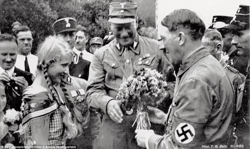 The smiling face of evil: Adolf Hitler