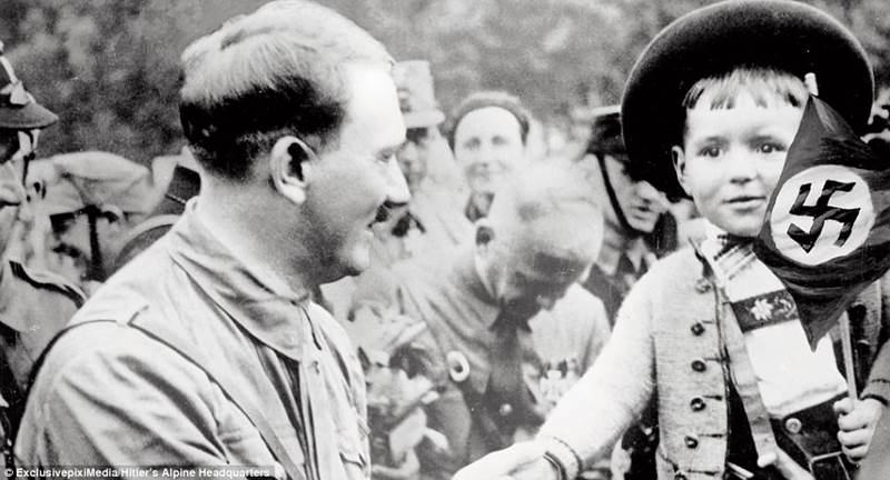 The smiling face of evil: Adolf Hitler