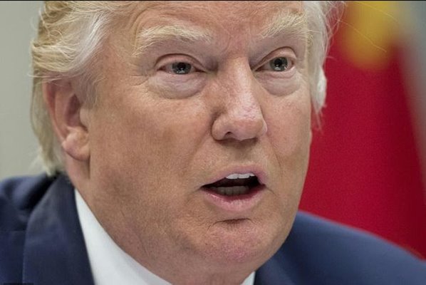 Donald Trump, seyahat yasağını revize etti, Iraklıları muaf tuttu