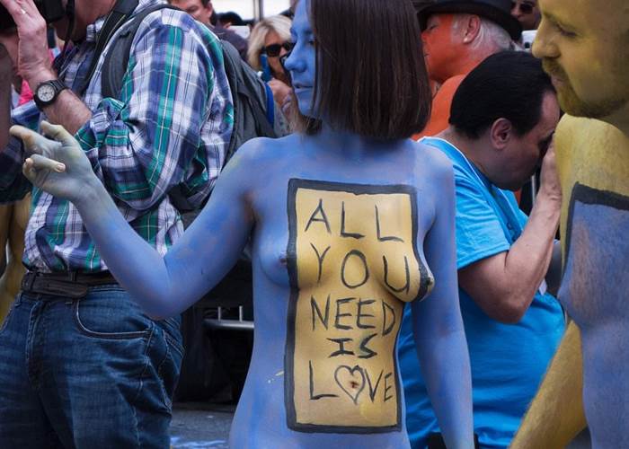 Hundreds of models pose NAKED in Times Square to 'promote positivity and acceptance'
