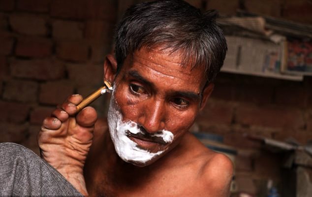 Watch: Courageous man born with no arms becomes professional tailor