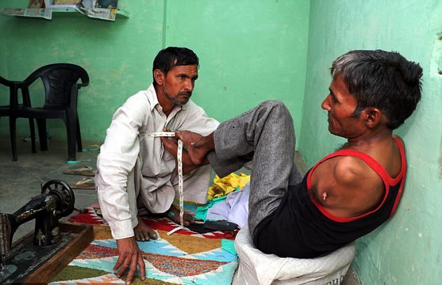 Watch: Courageous man born with no arms becomes professional tailor