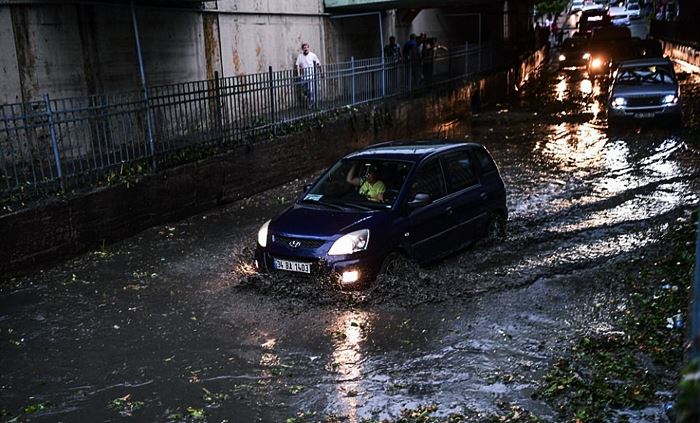Scenes as storms in Istanbul leave cars stranded in flood