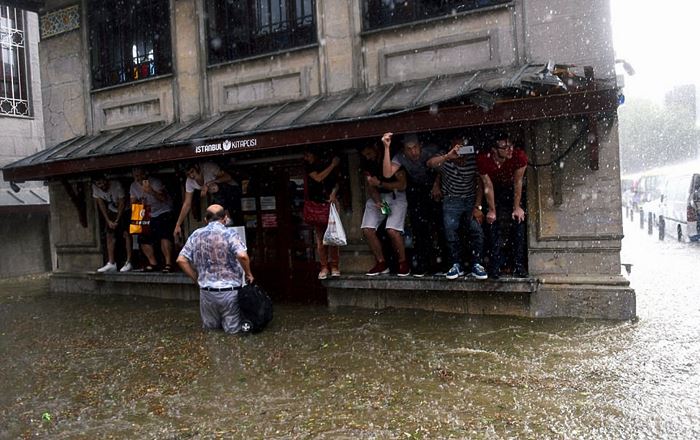 Scenes as storms in Istanbul leave cars stranded in flood