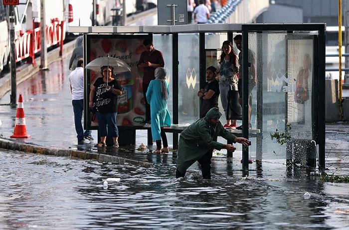 Scenes as storms in Istanbul leave cars stranded in flood