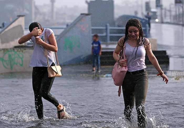 Scenes as storms in Istanbul leave cars stranded in flood