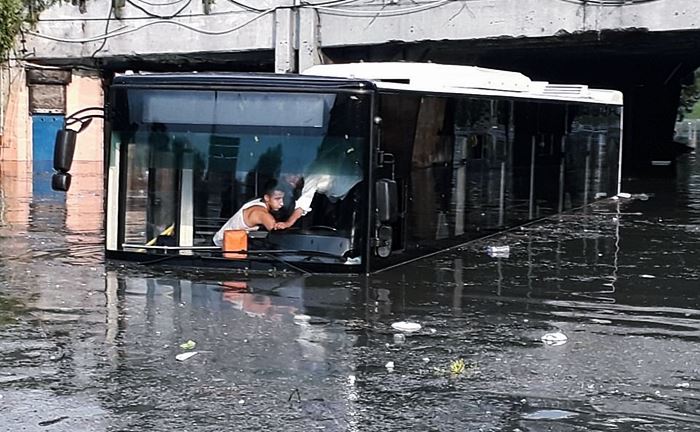 Scenes as storms in Istanbul leave cars stranded in flood