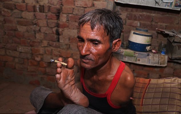 Watch: Courageous man born with no arms becomes professional tailor