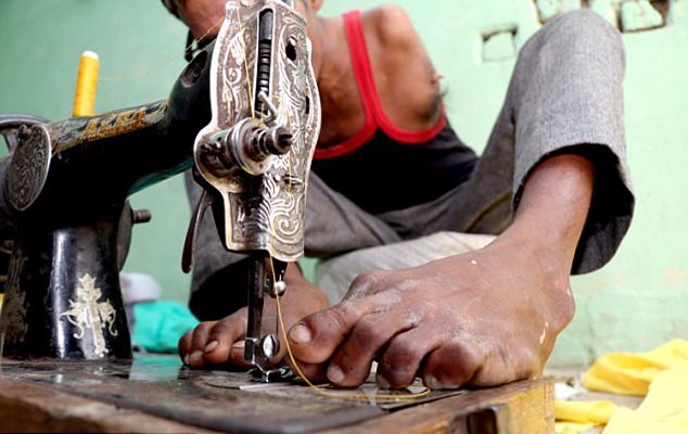 Watch: Courageous man born with no arms becomes professional tailor