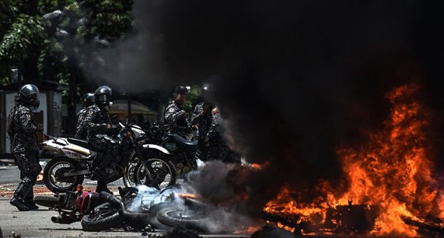 Venezuelan protestors capture and strip two National Guardsmen Video