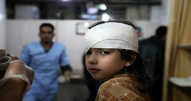 Footage shows man carrying body dead child Syria. Video