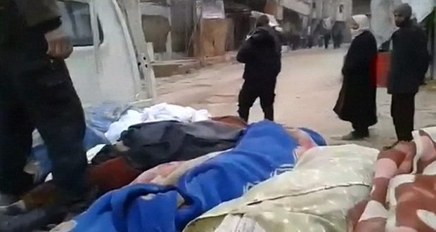Footage shows man carrying body dead child Syria. Video