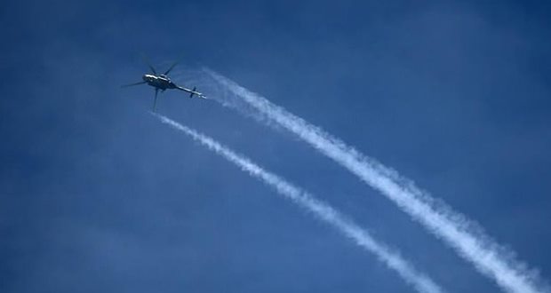 Footage shows man carrying body dead child Syria. Video