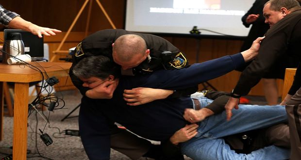 Father of three girls molested by Nassar tries to attack doctor- Video Father of three girls molested by Nassar tries to attack doctor