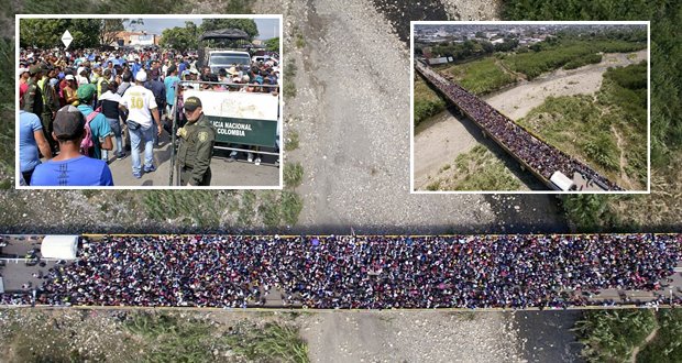 Massive crowds of Venezuelan migrants swarm Colombian border