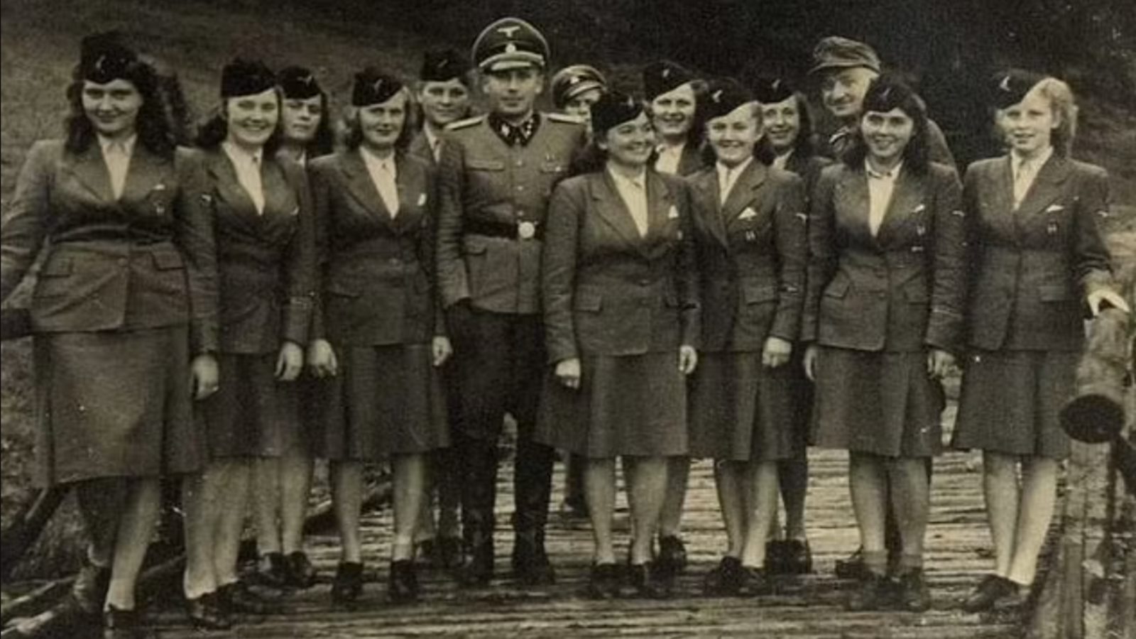 The Nazi party girls of Auschwitz: SS women romanced and caroused with death camp guard lovers as they oversaw the murder of thousands of Jews - before paying the ultimate price on the gallows
